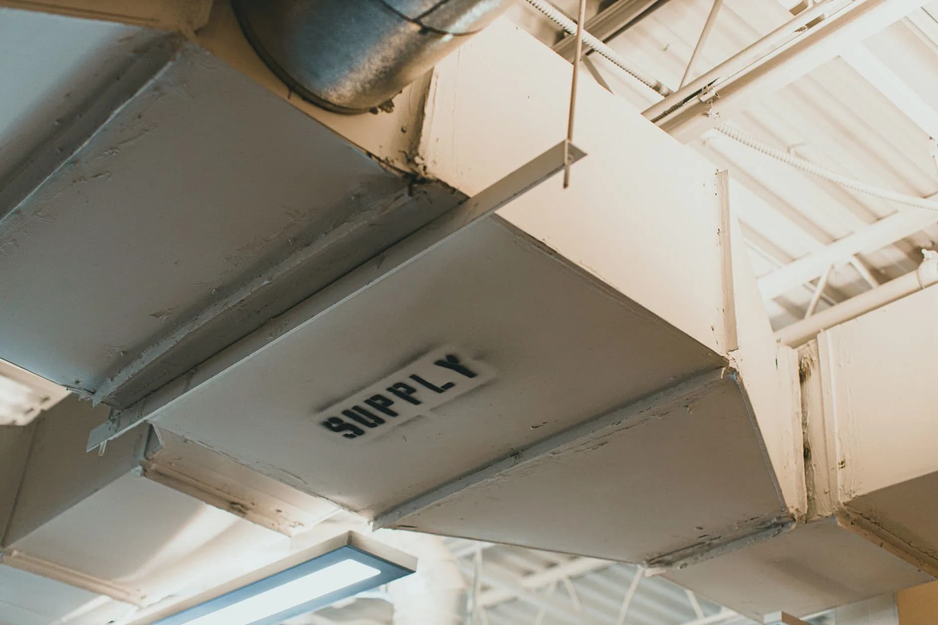 Ductwork running through a basement ceiling