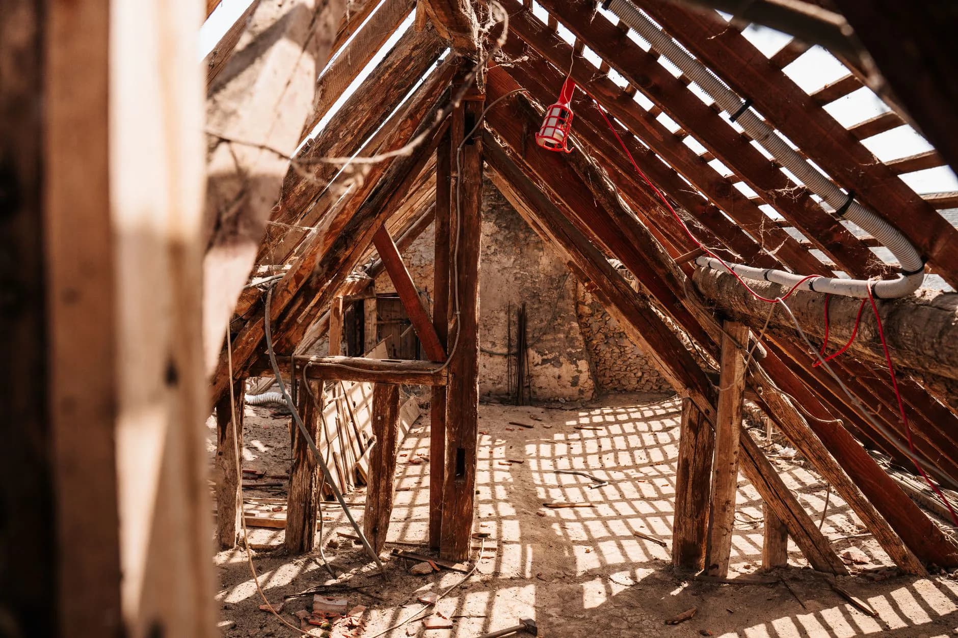 Rafters and framing inside an unfinished attic