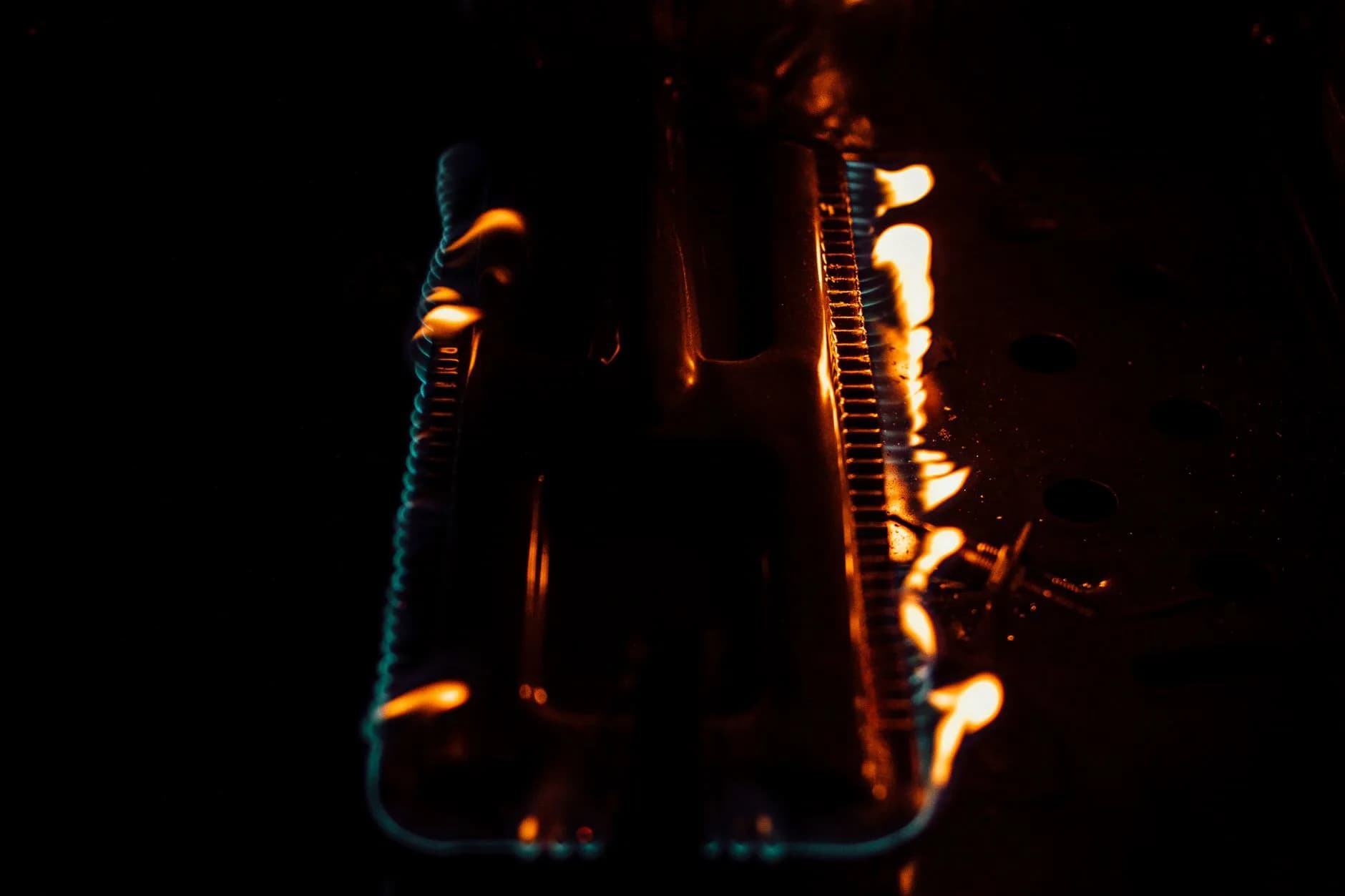 A blue gas flame at a burner