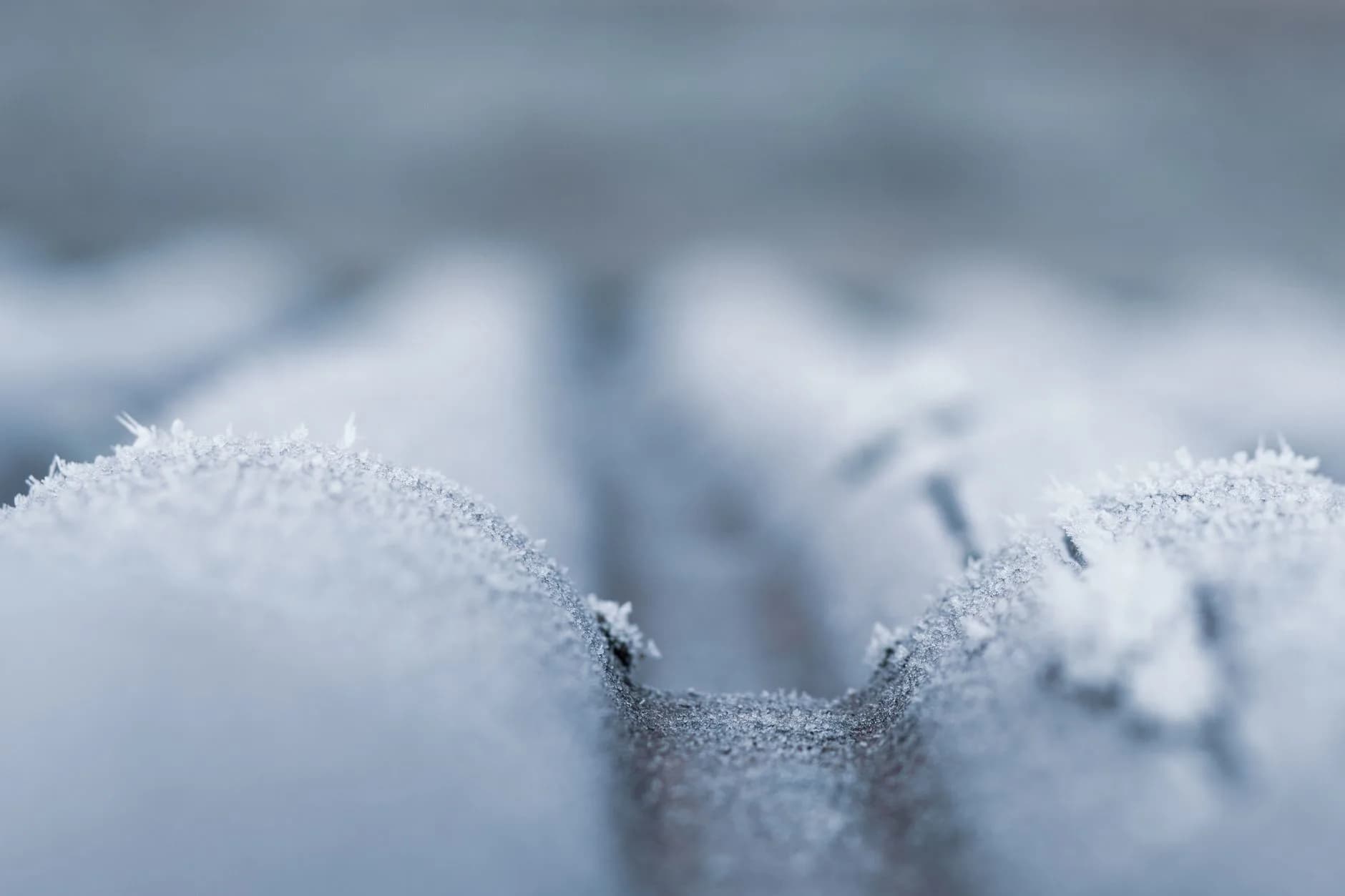 Frost forming on a cold metal surface