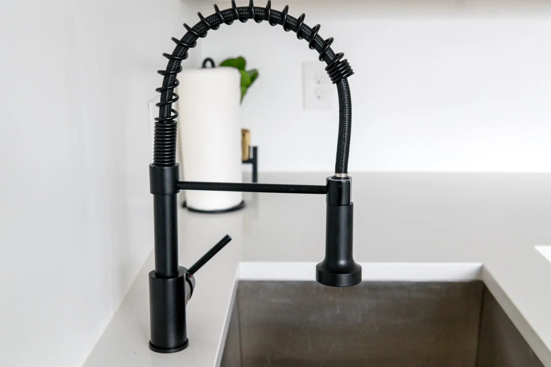 Plumbing under a kitchen sink