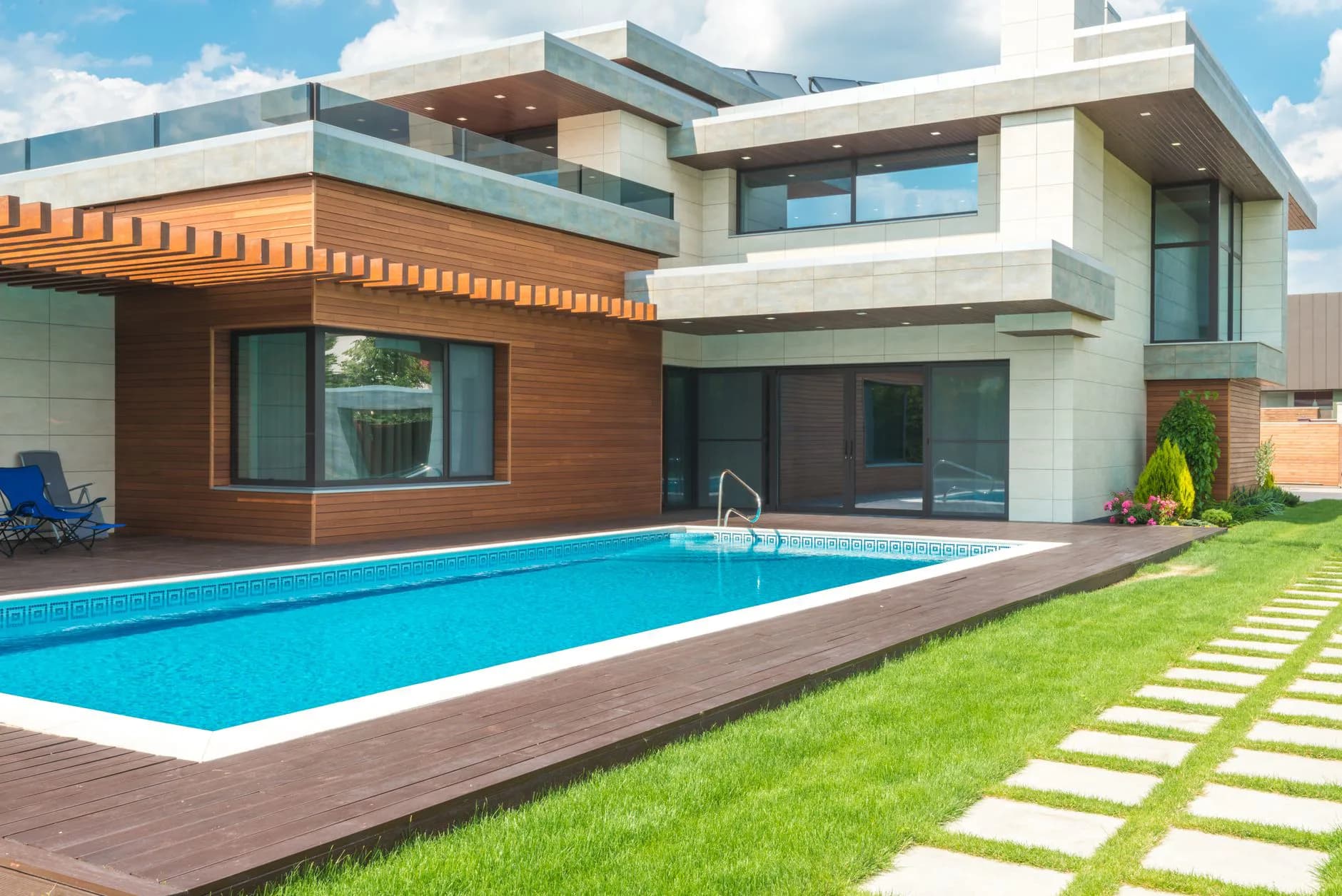 A pool beside a house