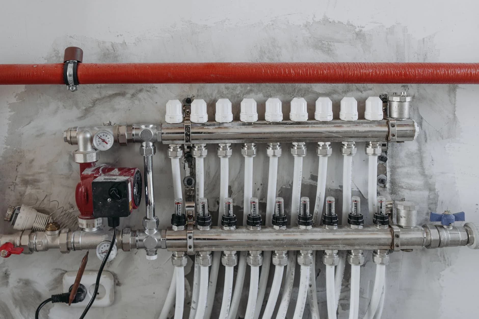A drain and valve at floor level
