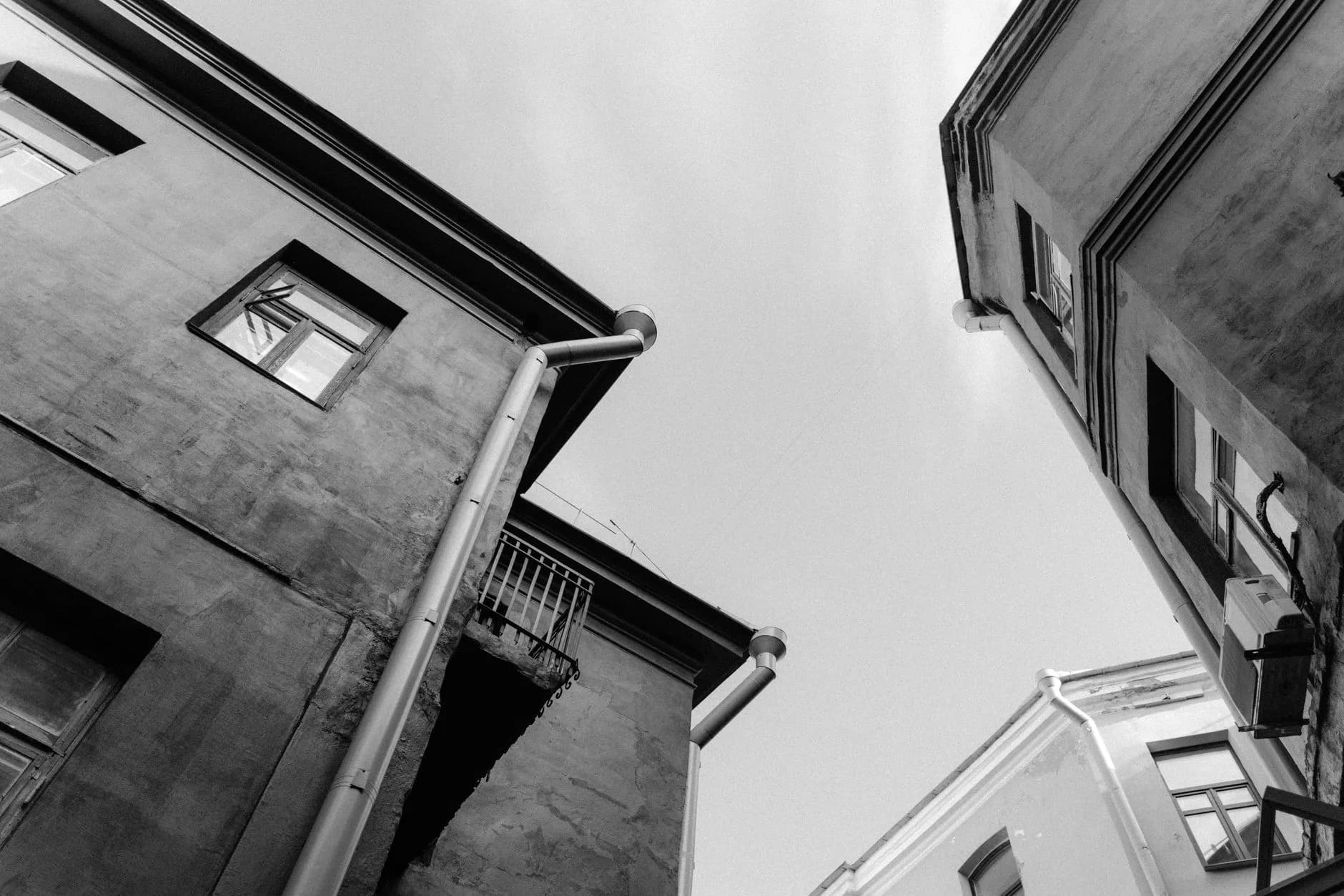 A downspout beside a house