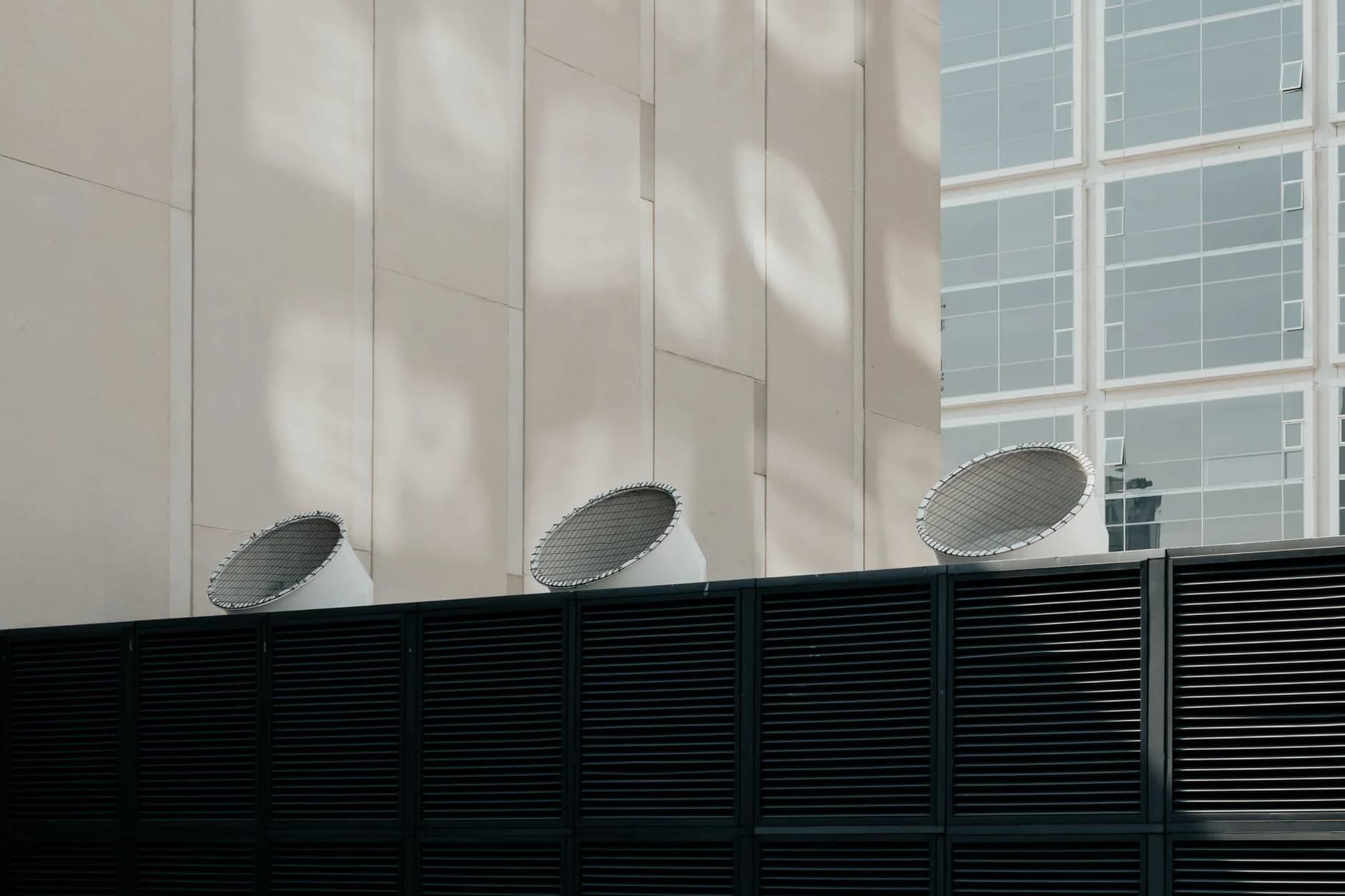 A large return air grille on an interior wall of a house
